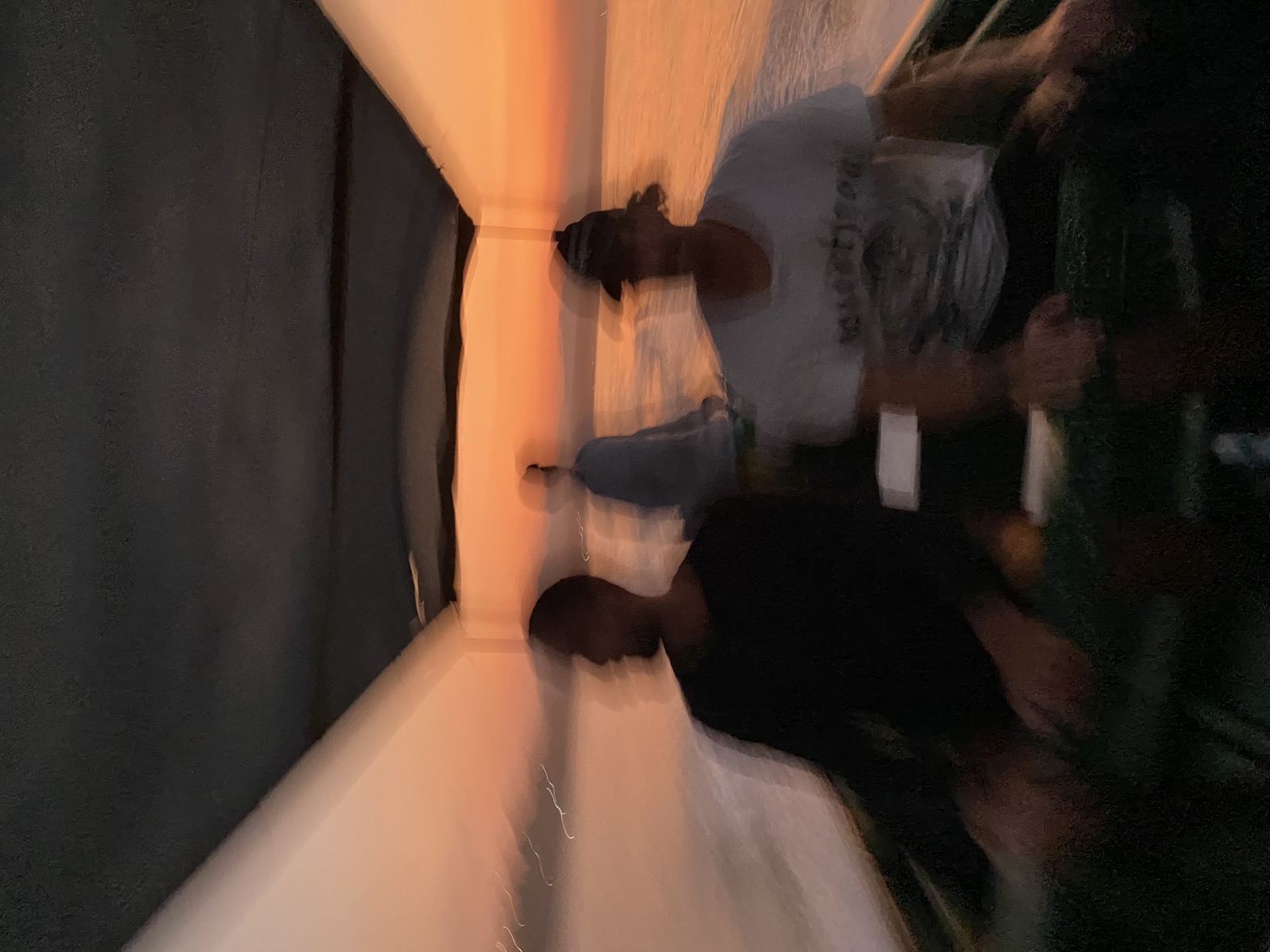 SurfXplore guests riding a boat at sunset in El Salvador