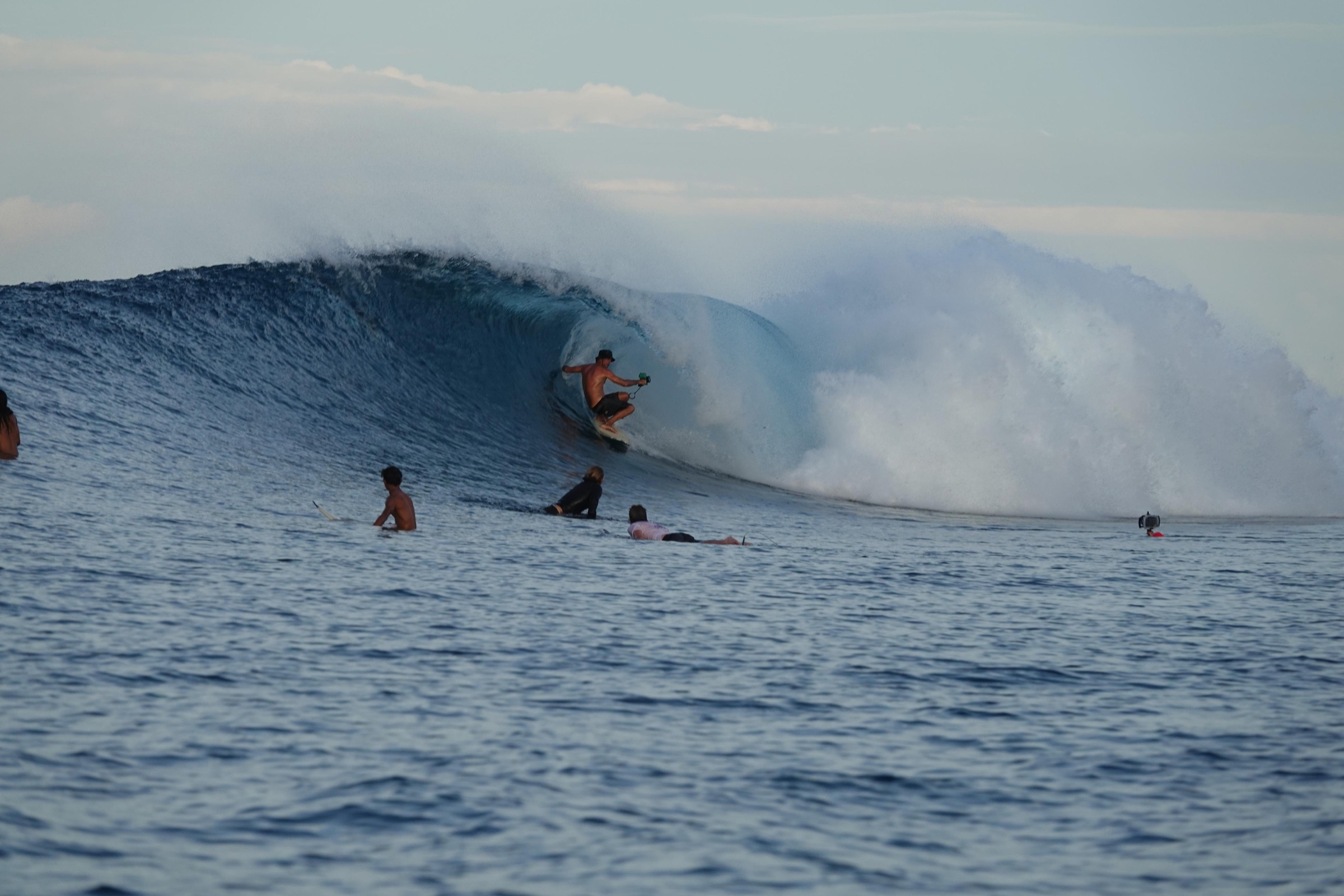 Surfer riding a powerful Mentawai reef wave